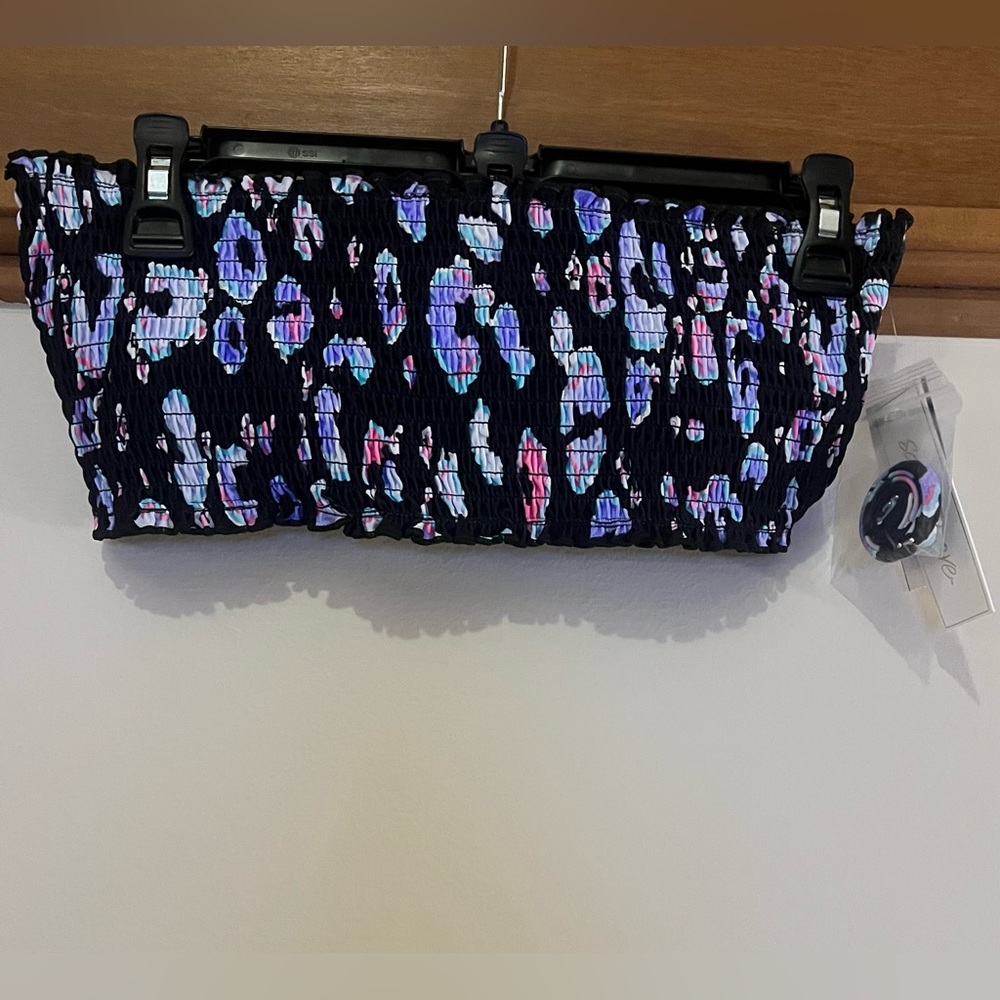 Black swim top with colorful cheetah print